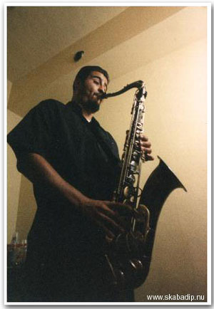 David Hillyard's departure after Hepcat's first album left a gap in the tenor sax role, but Efren Santana came in and beautifully took over this role. Now one-half of Hepcat's horn section, one can hear Efren accompany his fellow bandmates and frequently break out on his own fantastic solos. Efren enjoys heavy metal music, especially Slayer, but don't be shocked by this because the multi-styled Hepcat encompasses all types of music and this is what makes them so unique.